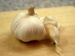 “Garlic cloves rich in allicin used as a natural antibiotic for minor infections”